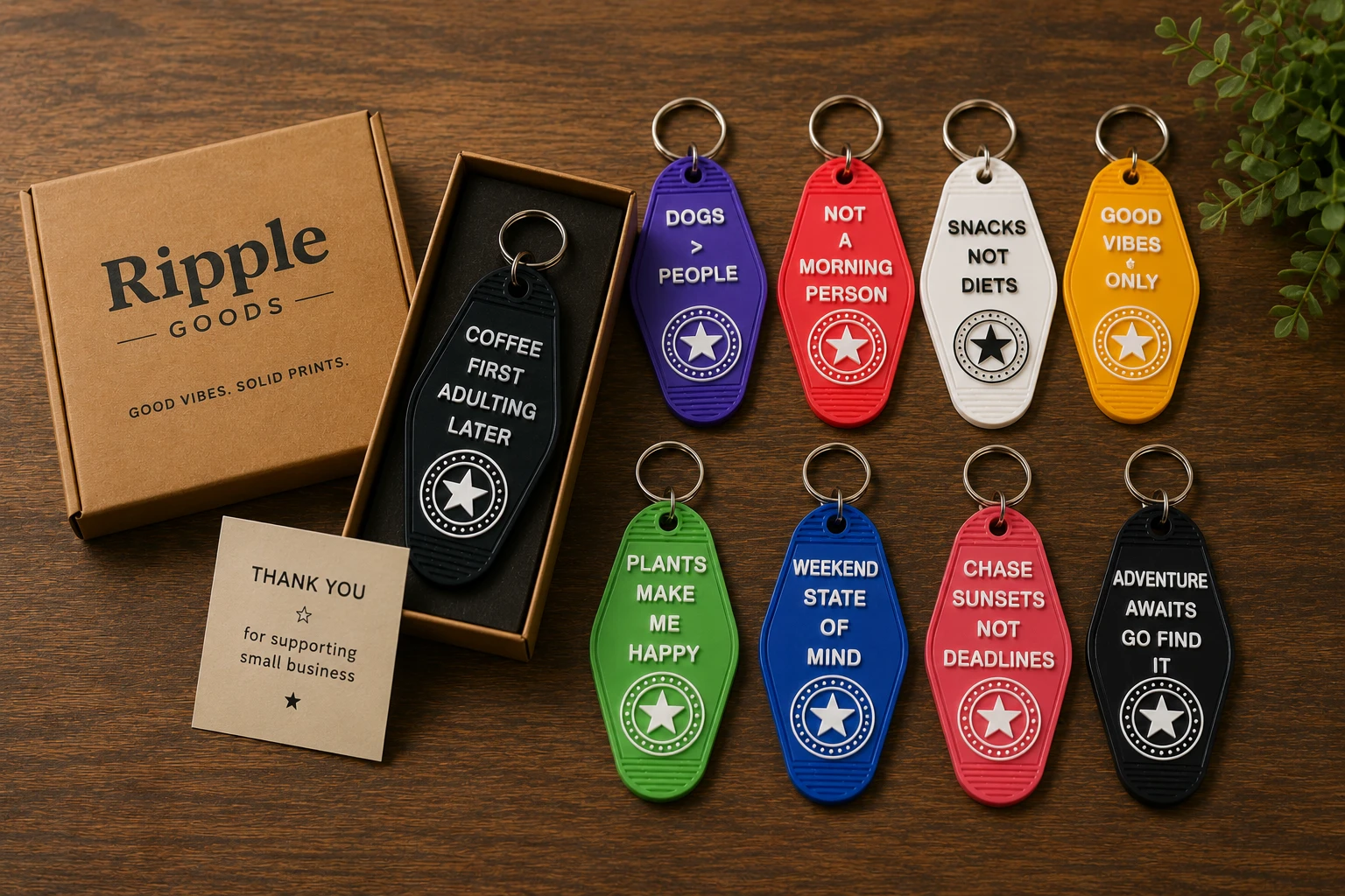 A Ripple Goods gift box with a collection of star-logo keychains